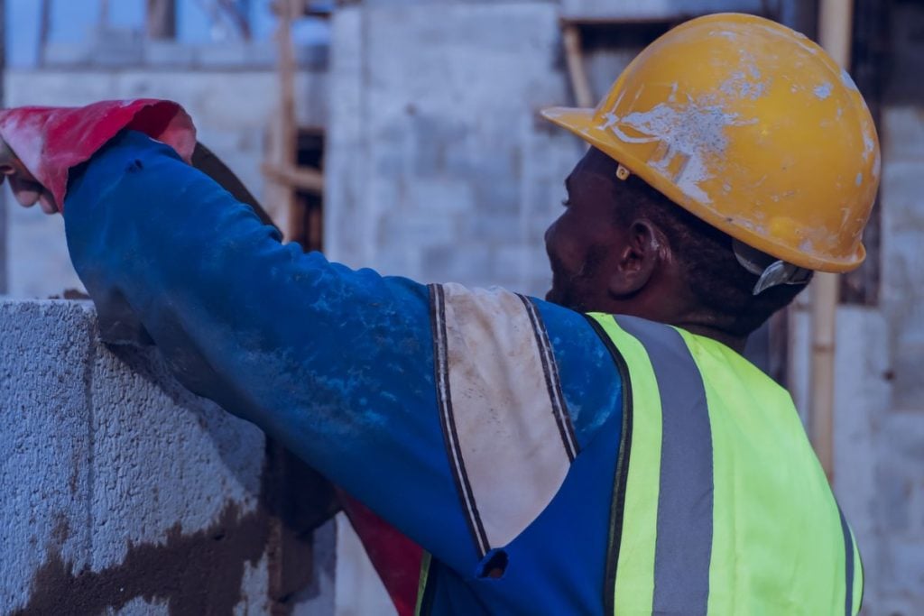 Construction contractor reviewing plans
