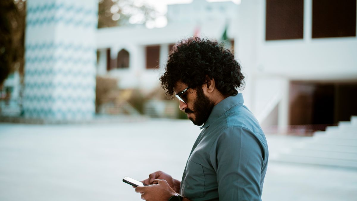 Business owner checking their funding options on a phone
