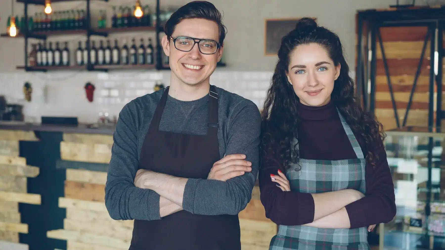 5 Reasons Kentucky Business Owners Get Business Financing in 2026 2 Two Kentucky restaurant owners in aprons standing in their dining room