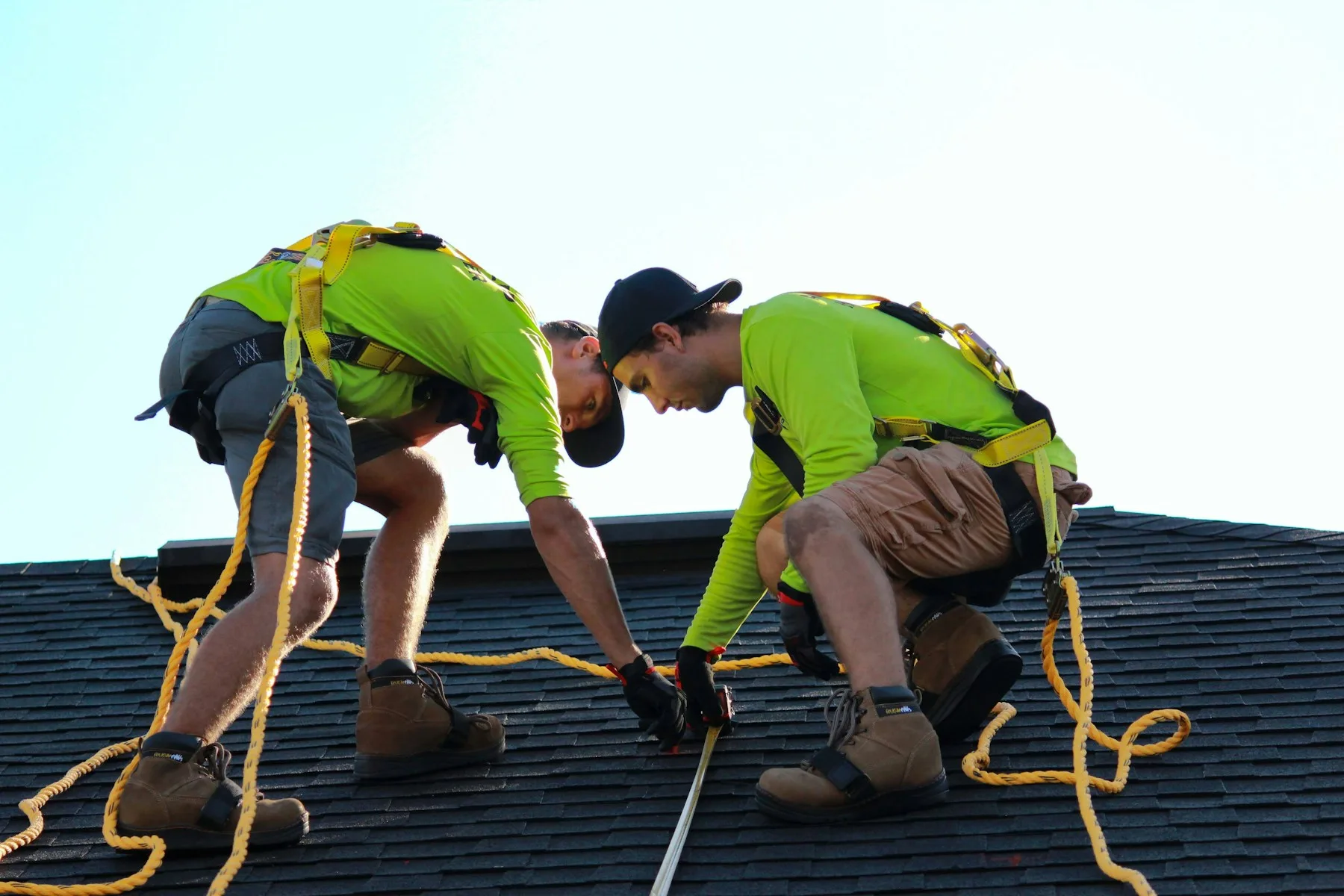 5 Reasons Oklahoma Business Owners Get Business Financing in 2026 2 Roofing contractors installing shingles, a common Oklahoma business that uses financing after storm season