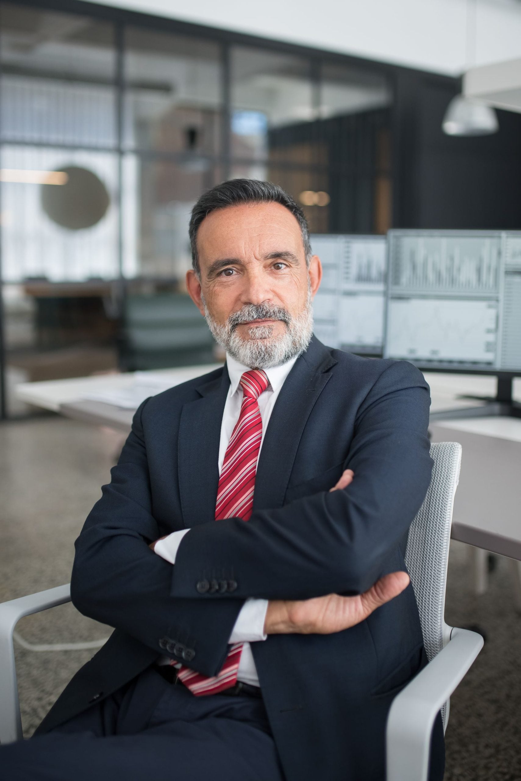 How to Get a $5 Million Business Loan: SBA, Bank, Asset-Based and Equipment Routes (2026) 2 Executive in a suit standing in a corporate office