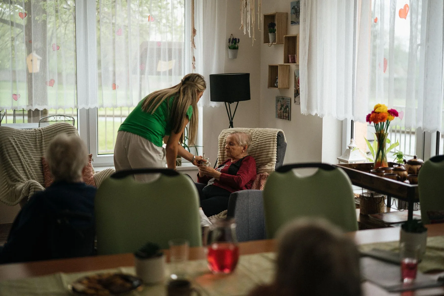 Assisted Living Business Loans: Options, Requirements, Speed 2 Caregiver helping residents in an assisted living facility