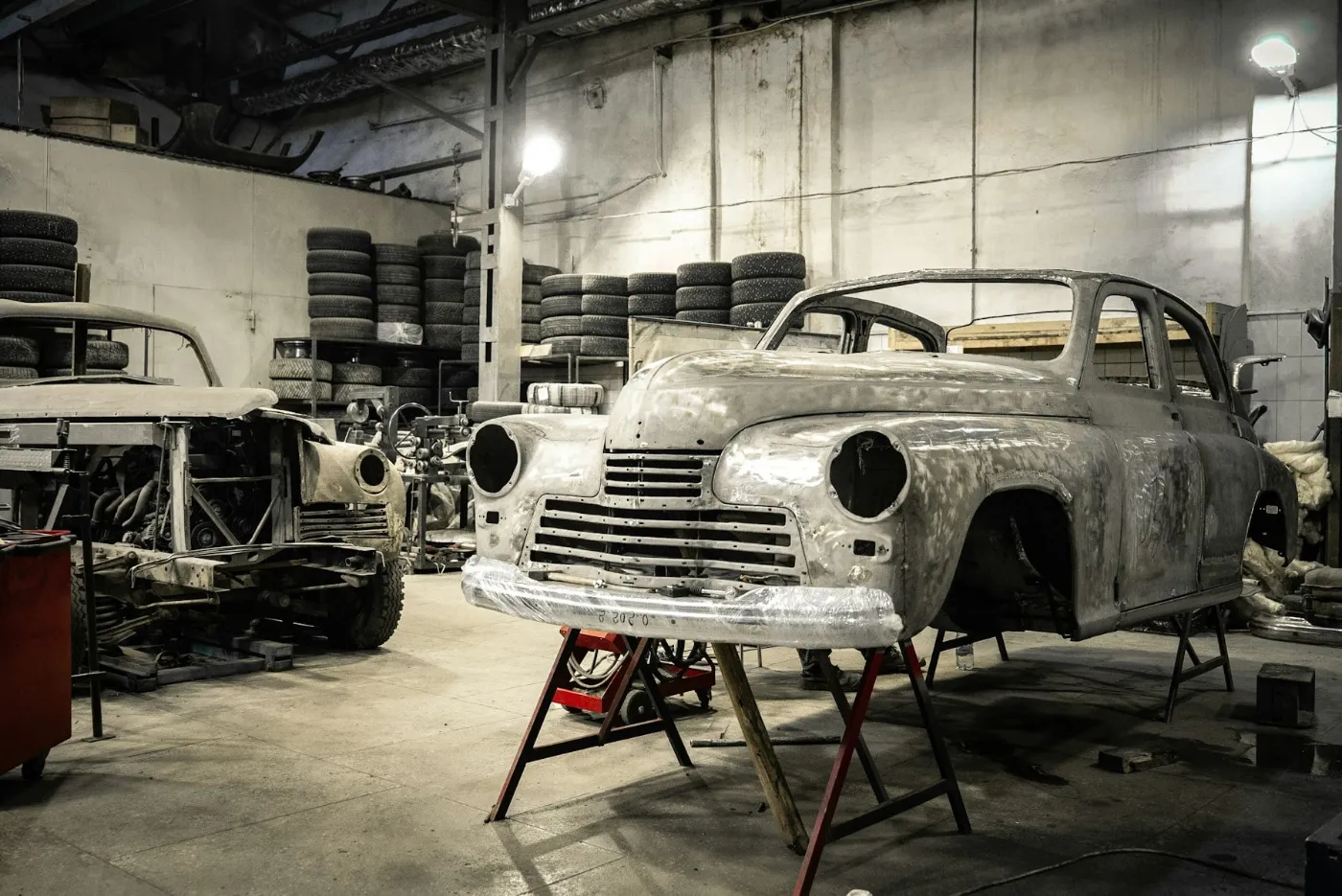 Auto Body Shop Loans: Funding for Collision Repair Shops 2 Classic car body stripped to bare metal inside an auto body shop