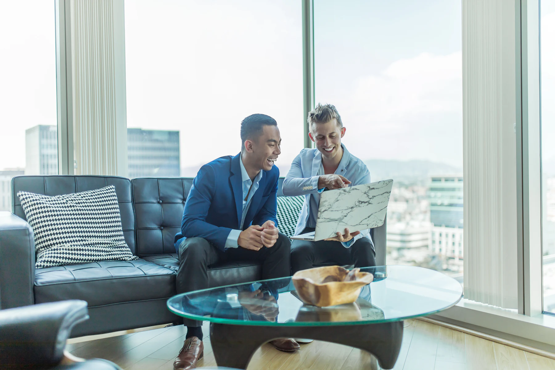 Who Will Give Me a Business Loan When Banks Say No? 2 Two men in suits sitting on a sofa