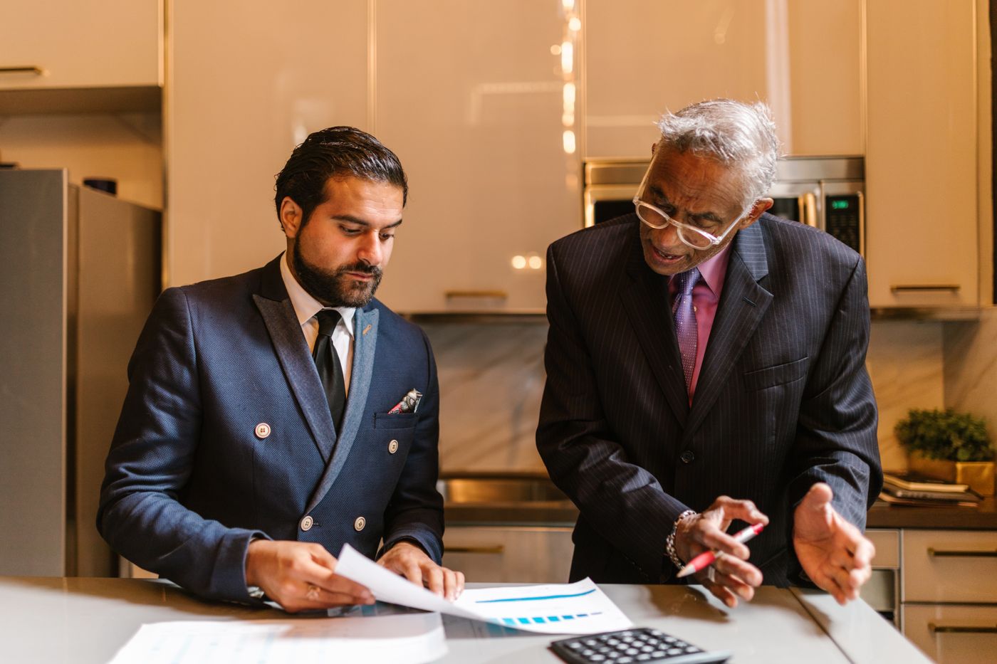 Best Business Loan Brokers for Established Small Businesses (2026) 2 Business owner reviewing financing options with a funding specialist