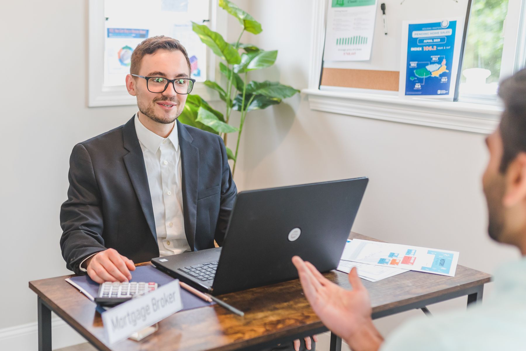 Best SBA Lenders of 2026: Newtek, Live Oak, Chase and iBusiness Funding Compared 2 Lender and business owner discussing SBA loan options in a modern office