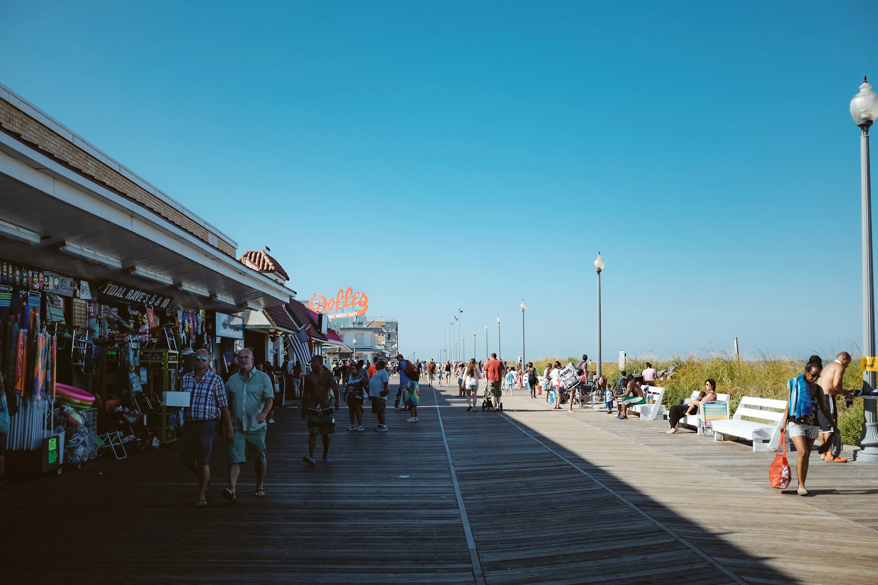 5 Reasons Delaware Business Owners Get Business Financing in 2026 2 People walking along a street in Rehoboth Beach during the day