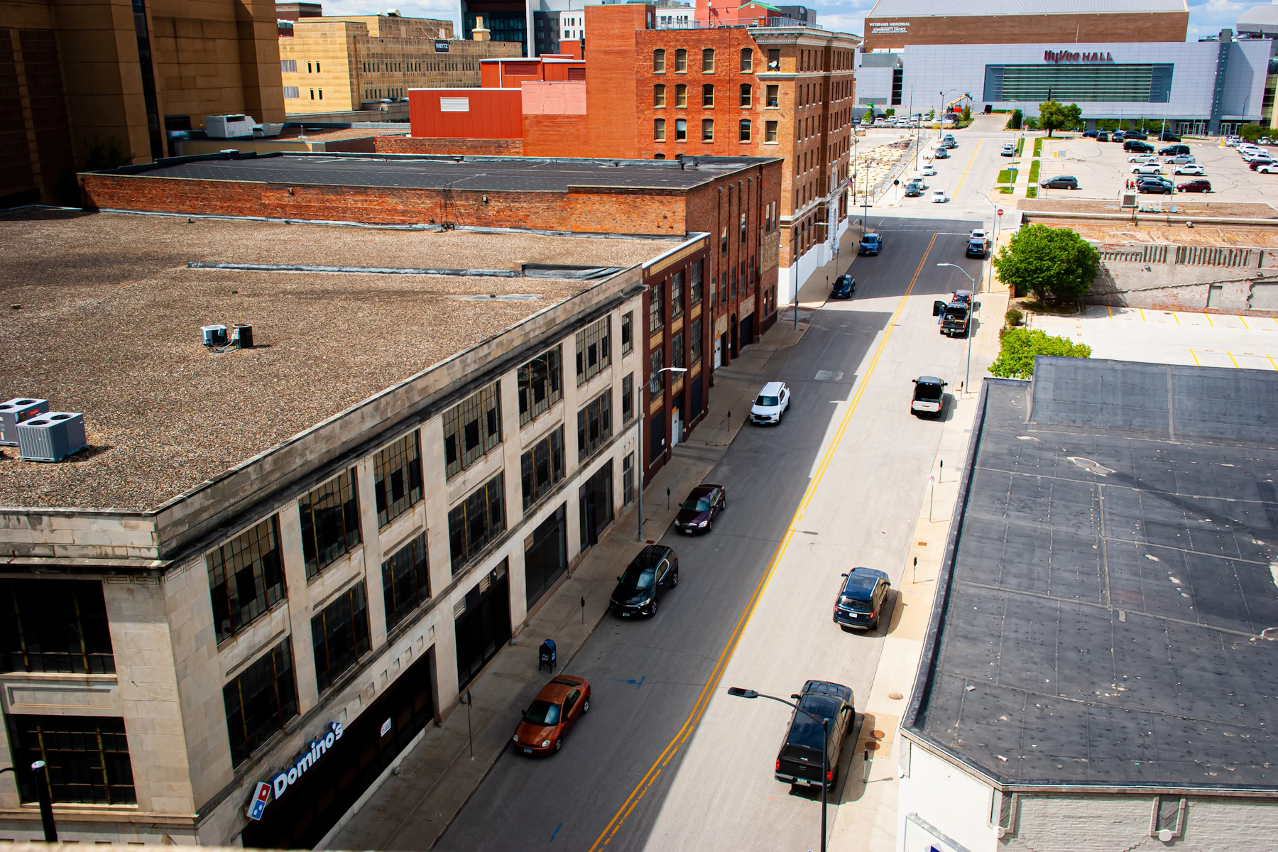 5 Reasons Iowa Business Owners Get Business Financing in 2026 2 Des Moines, Iowa street with heavy traffic next to tall buildings