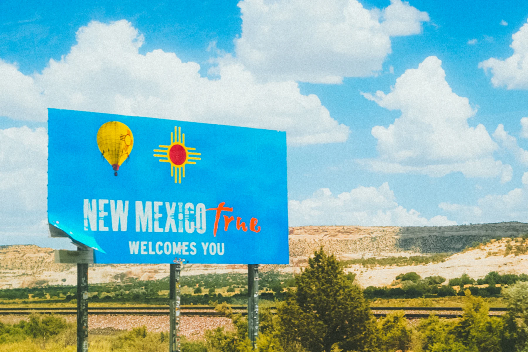 New Mexico welcome sign beside a road
