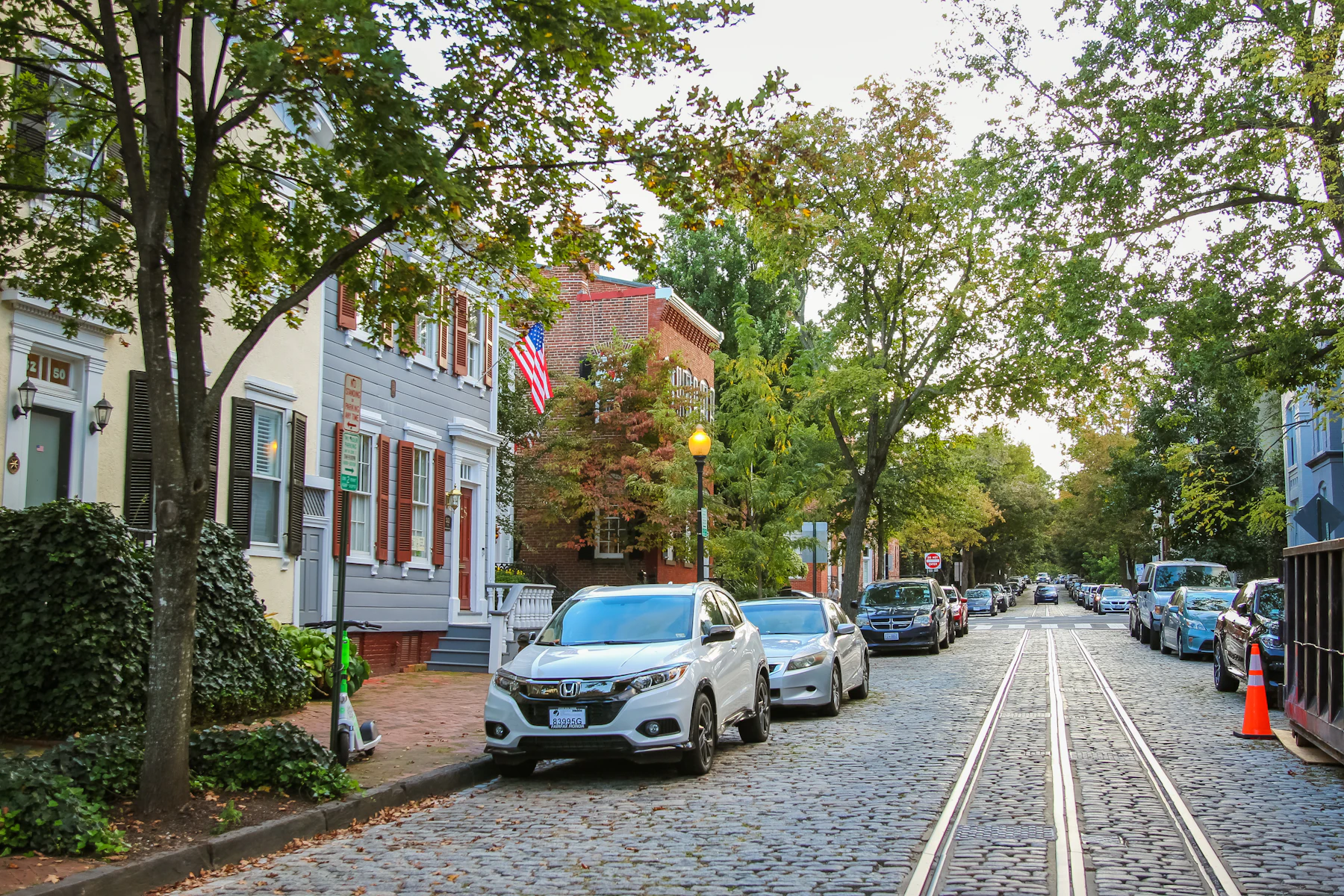 5 Reasons Washington, D.C. Business Owners Get Business Financing in 2026 2 Street lined with parked cars and trees in Georgetown, Washington, DC