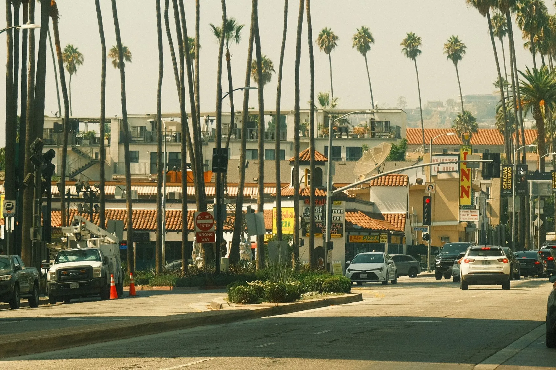 Business Funding in California: Options and Requirements (2026) 2 Busy Los Angeles street lined with palm trees