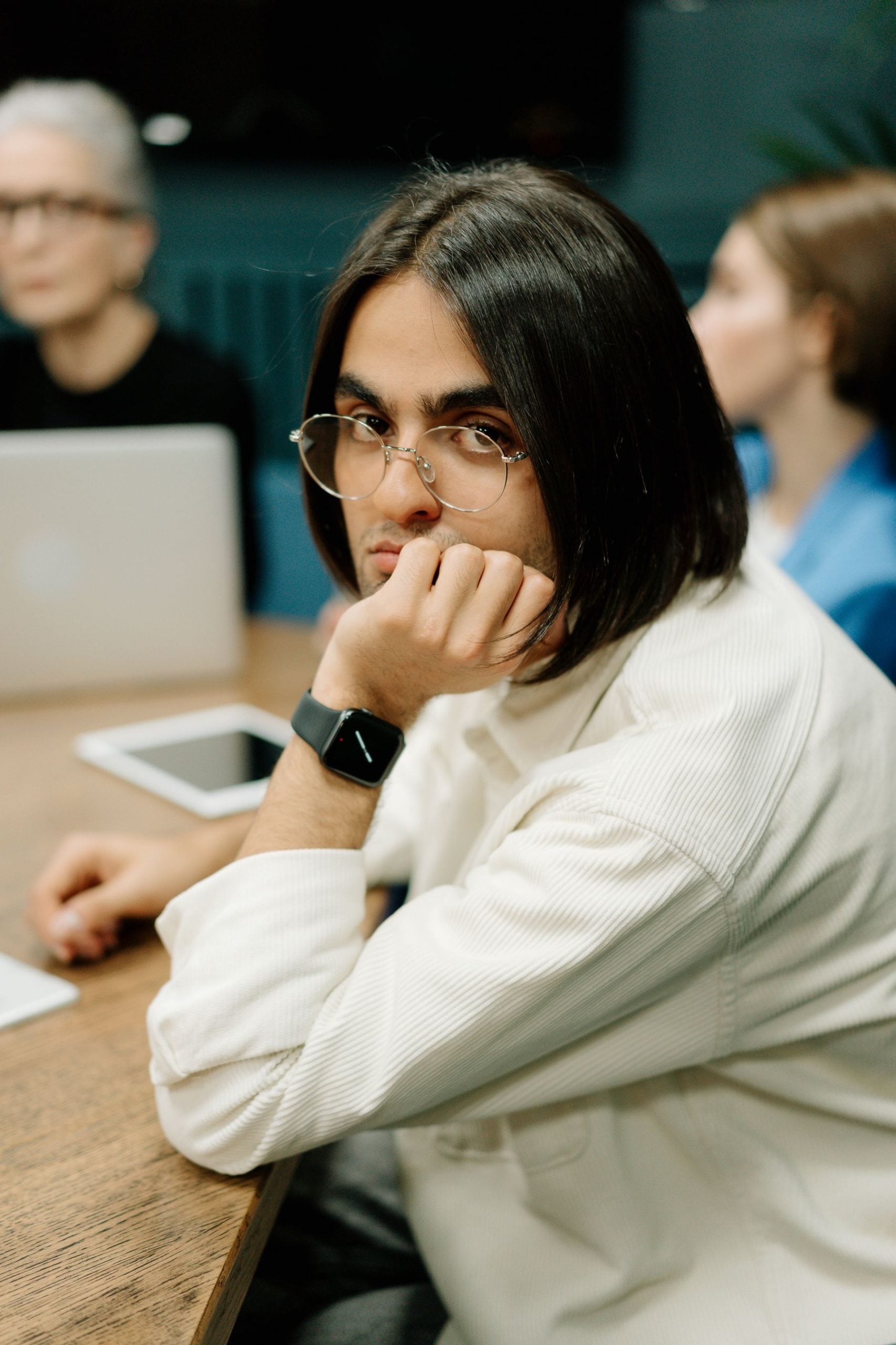 Business Funding Qualification Estimator: See What Your Business Likely Qualifies For Before You Apply (2026) 2 Business owner at a desk reviewing options on a tablet