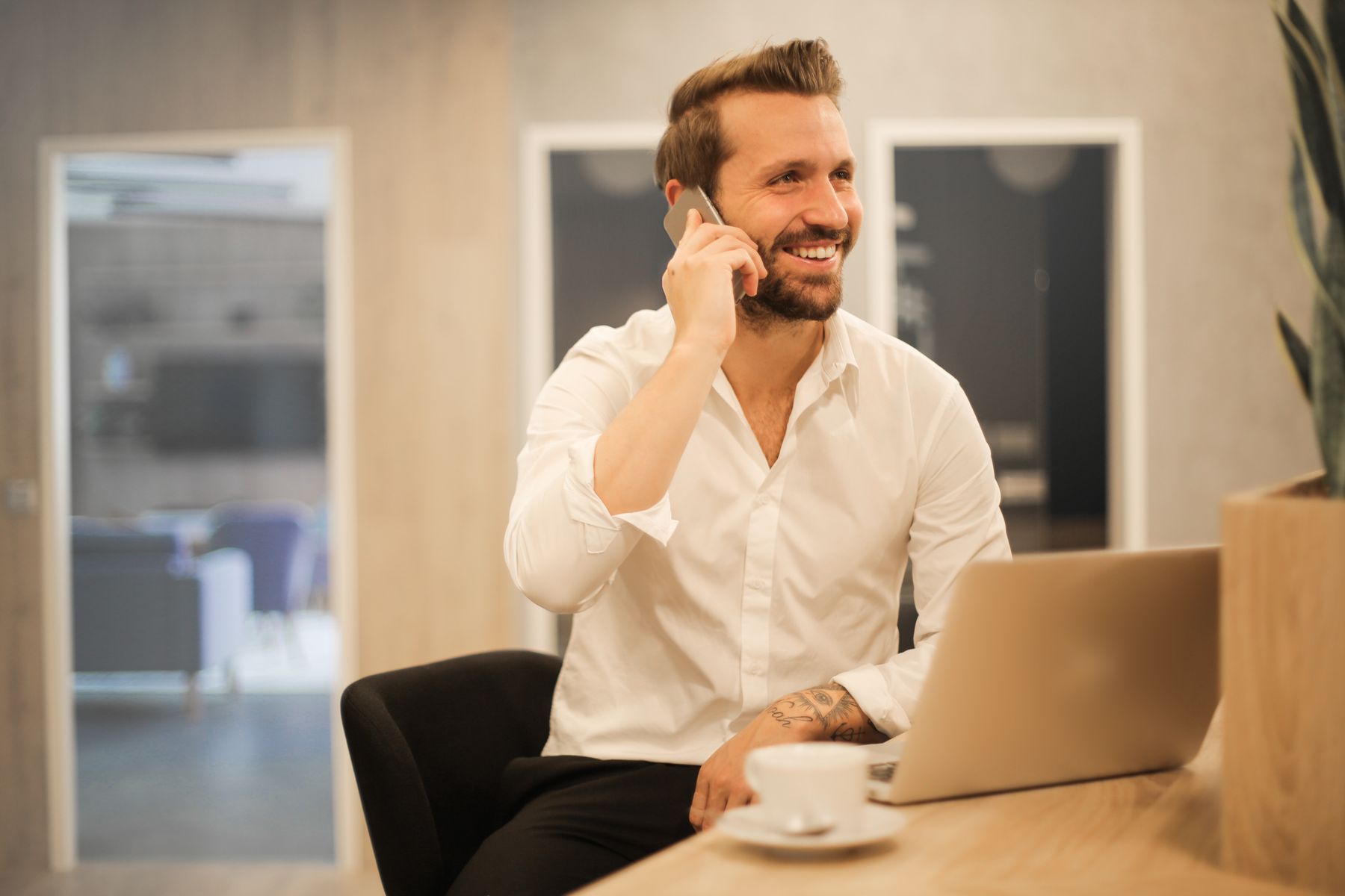 Business Loans for the Self-Employed, Sole Proprietors and 1099 Contractors (2026) 2 Self-employed business owner working on a laptop in a home office