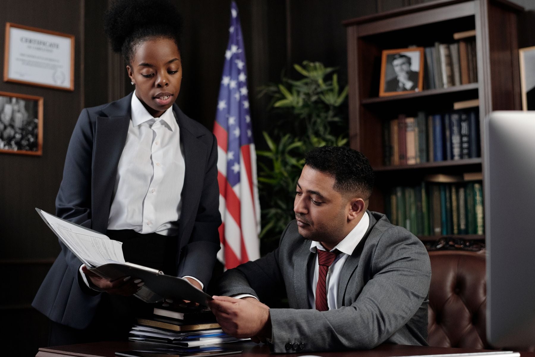 Business Loans for Veteran-Owned Businesses: SBA Fee Relief, Certifications and What Gets Approved (2026) 2 Veteran business owner at his desk with the U.S. flag