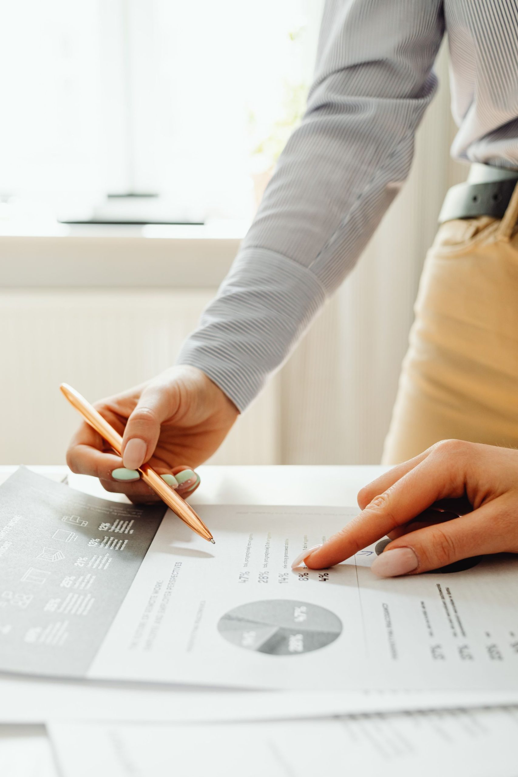 Business Loans Without a Personal Guarantee: What Is Available and What It Takes (2026) 2 Signing a business financing agreement at a desk