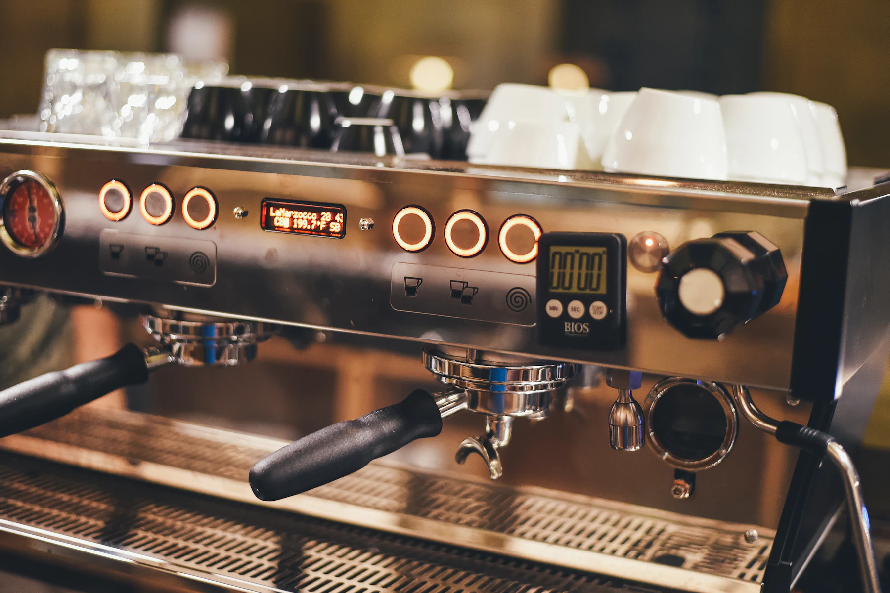 Coffee Shop Business Loans: Funding for Independent Cafés and Roasters 2 Close-up view of a gray espresso machine