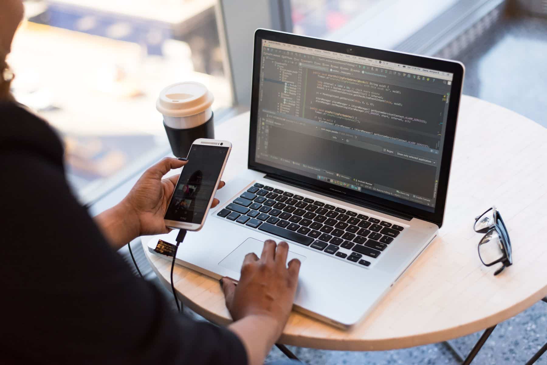 Easiest Business Loans to Get Approved For in 2026 (Ranked by Approval Odds) 2 Business owner working through a loan application on a laptop