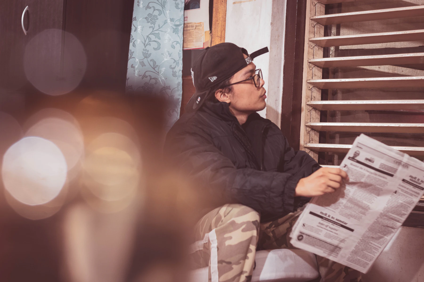 Fast Business Funding After the Fed's September 2026 Rate Hike 2 Man in a cap reading a newspaper at a cafe table