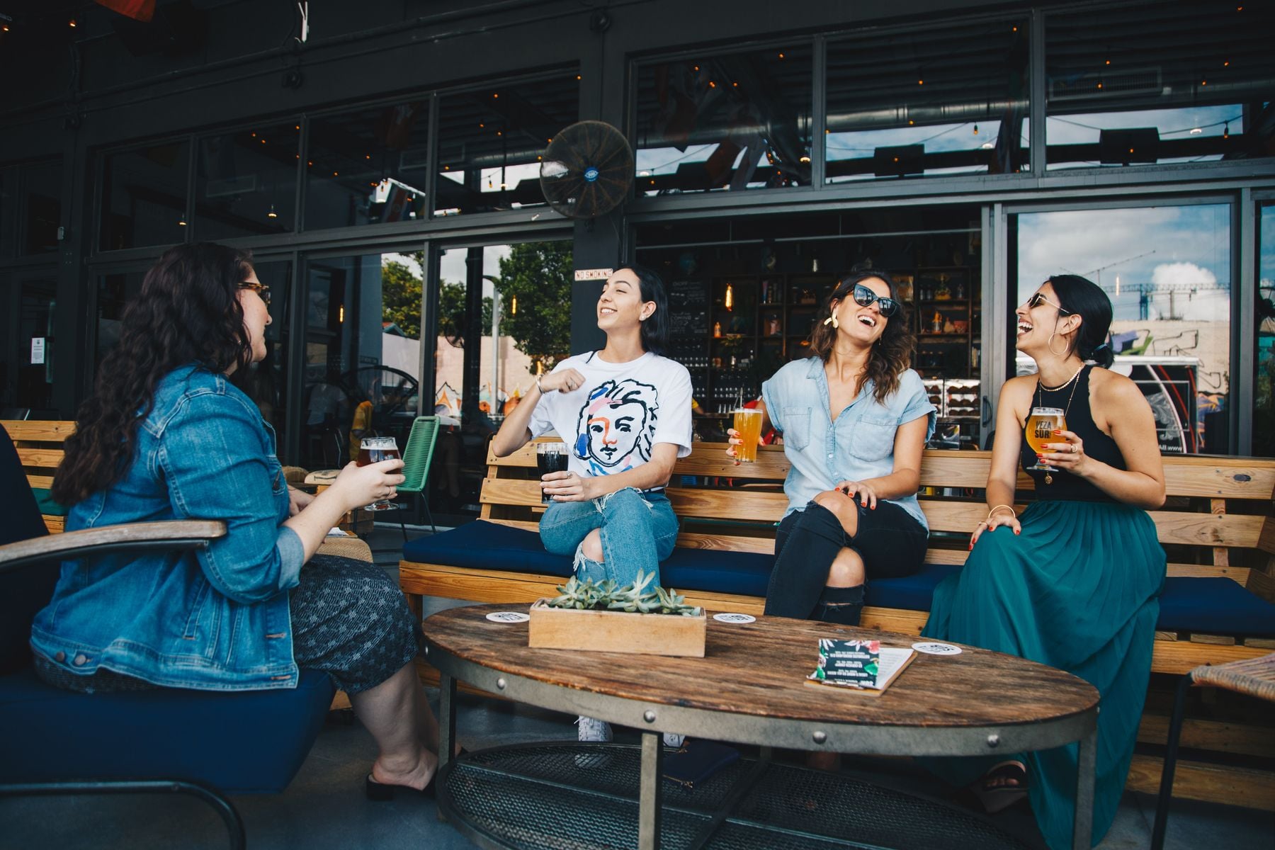 Franchise Business Loans for Existing Franchisees: Remodels, Second Units, Royalty Gaps and Equipment (2026) 2 Owner and staff inside a busy franchise cafe