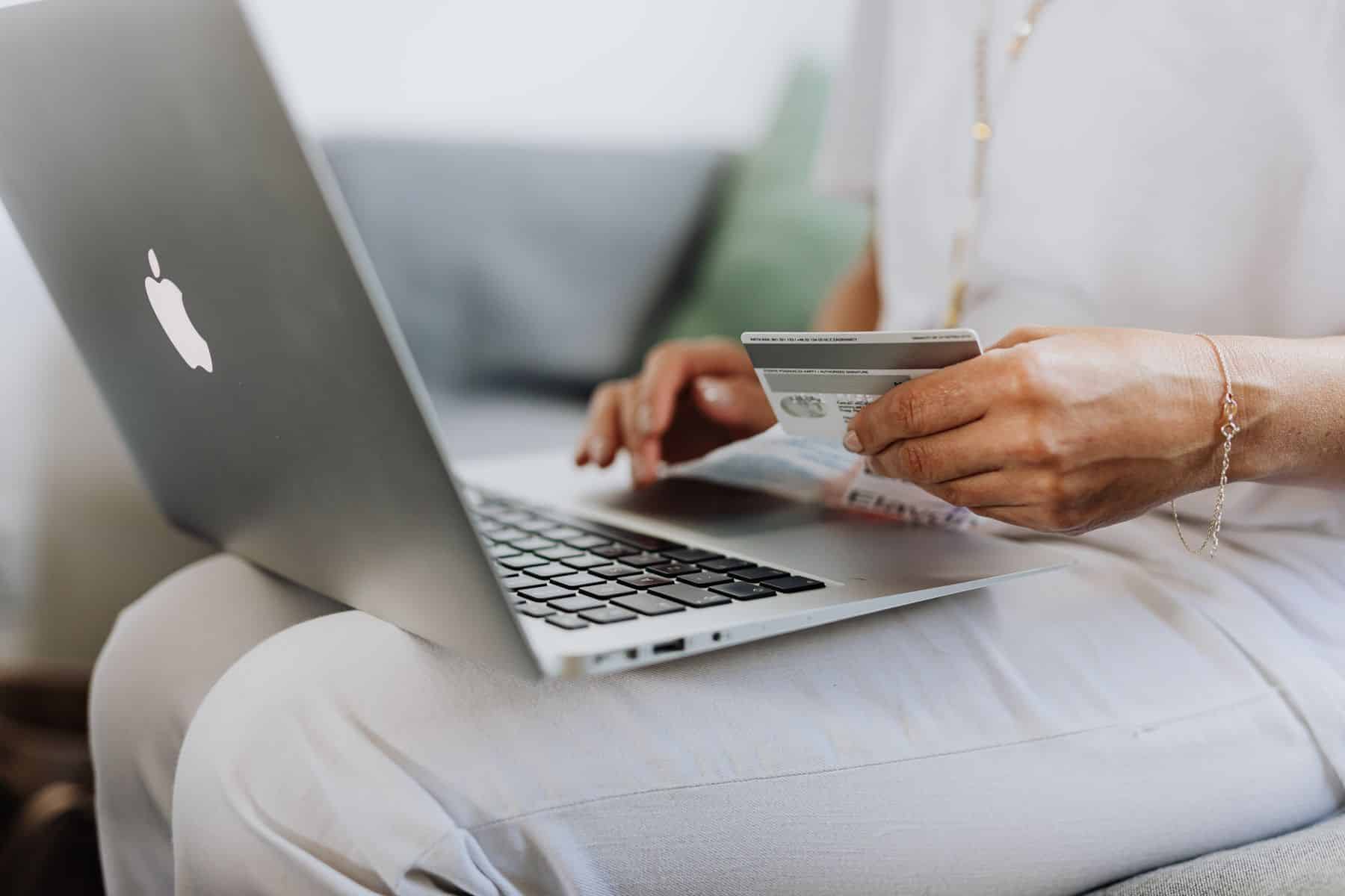 Holiday Inventory Financing in 2026: How Retailers Fund Stock Before a Record Season 2 Retail owner placing a holiday inventory order on a laptop