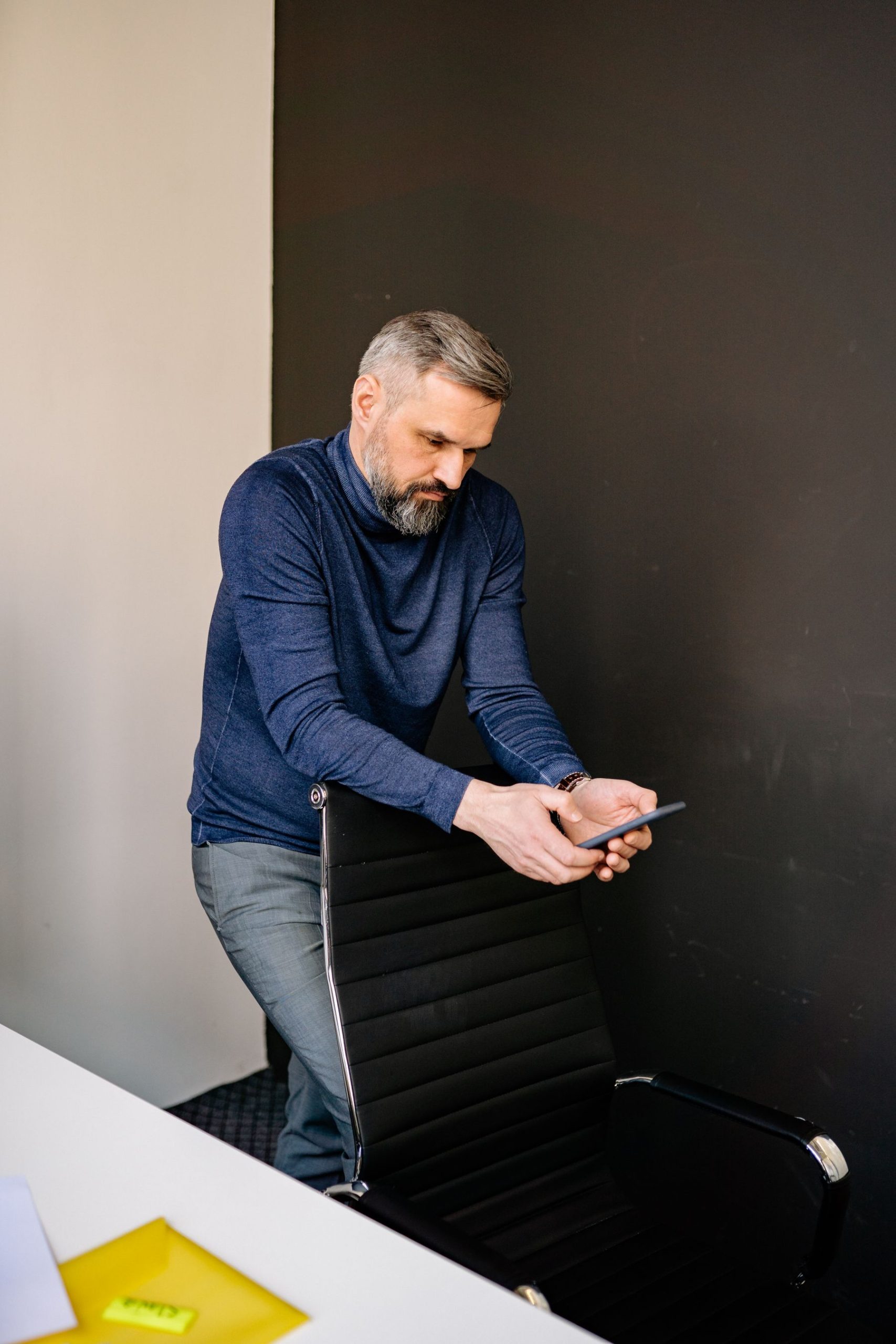 How to Get Out of a Merchant Cash Advance: 6 Options Ranked From Cheapest to Last Resort (2026) 2 Business owner thinking through repayment options at a desk