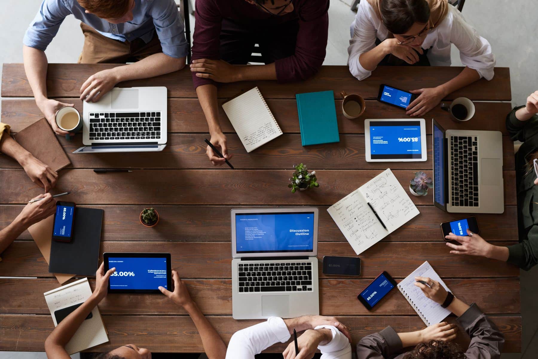 Instant Business Funding: What Actually Funds Today, What It Costs and How to Qualify (2026) 2 Business owner submitting a funding application on a laptop at a shared desk
