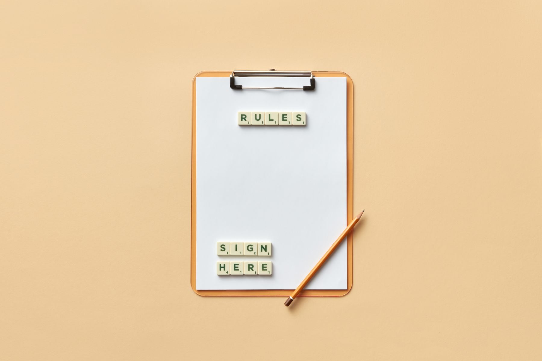 New SBA Loan Rules Took Effect October 1, 2026: What Borrowers, Buyers and Sellers Need to Know 2 Clipboard with letter tiles spelling rules, representing the new SBA loan rules effective October 2026