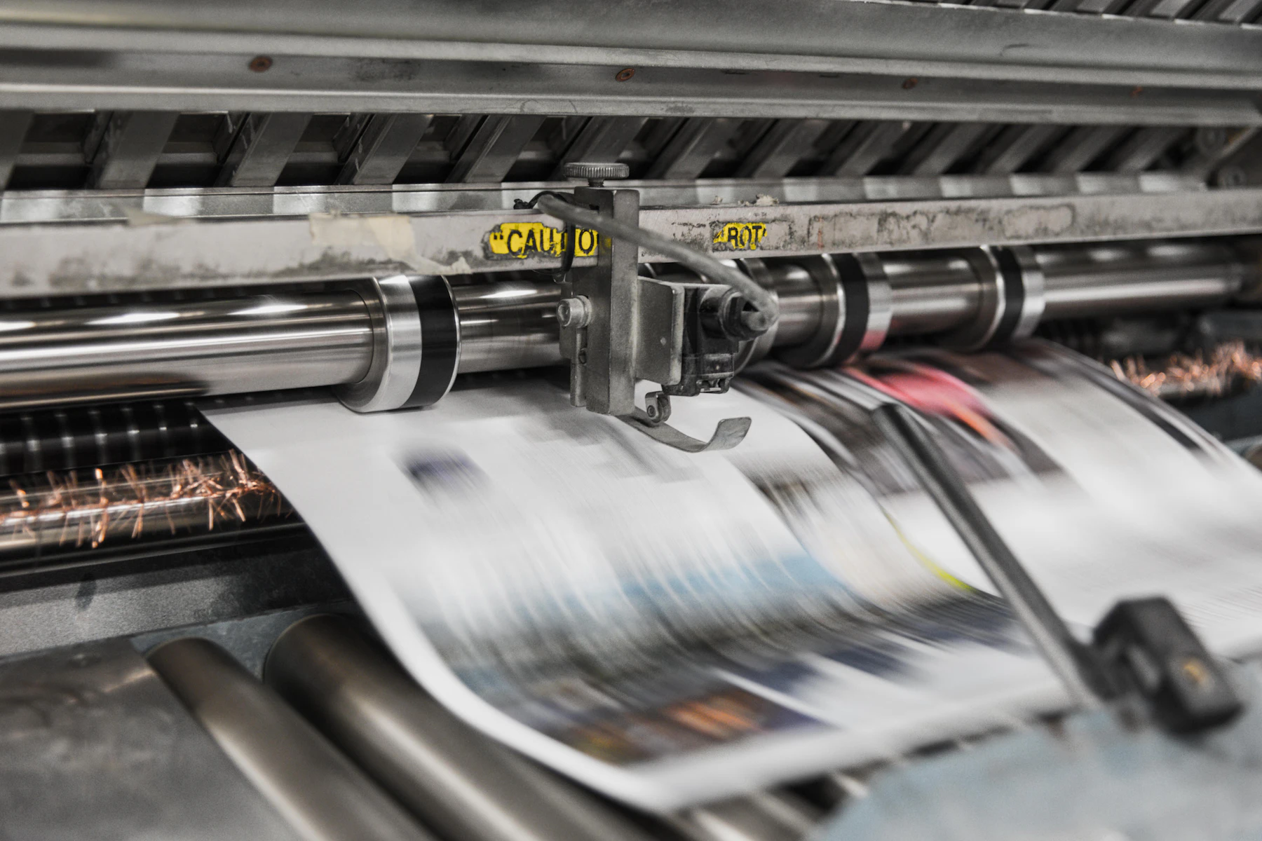 Next-Day Business Funding: How It Works and What You Need 2 Printing machine in a print shop