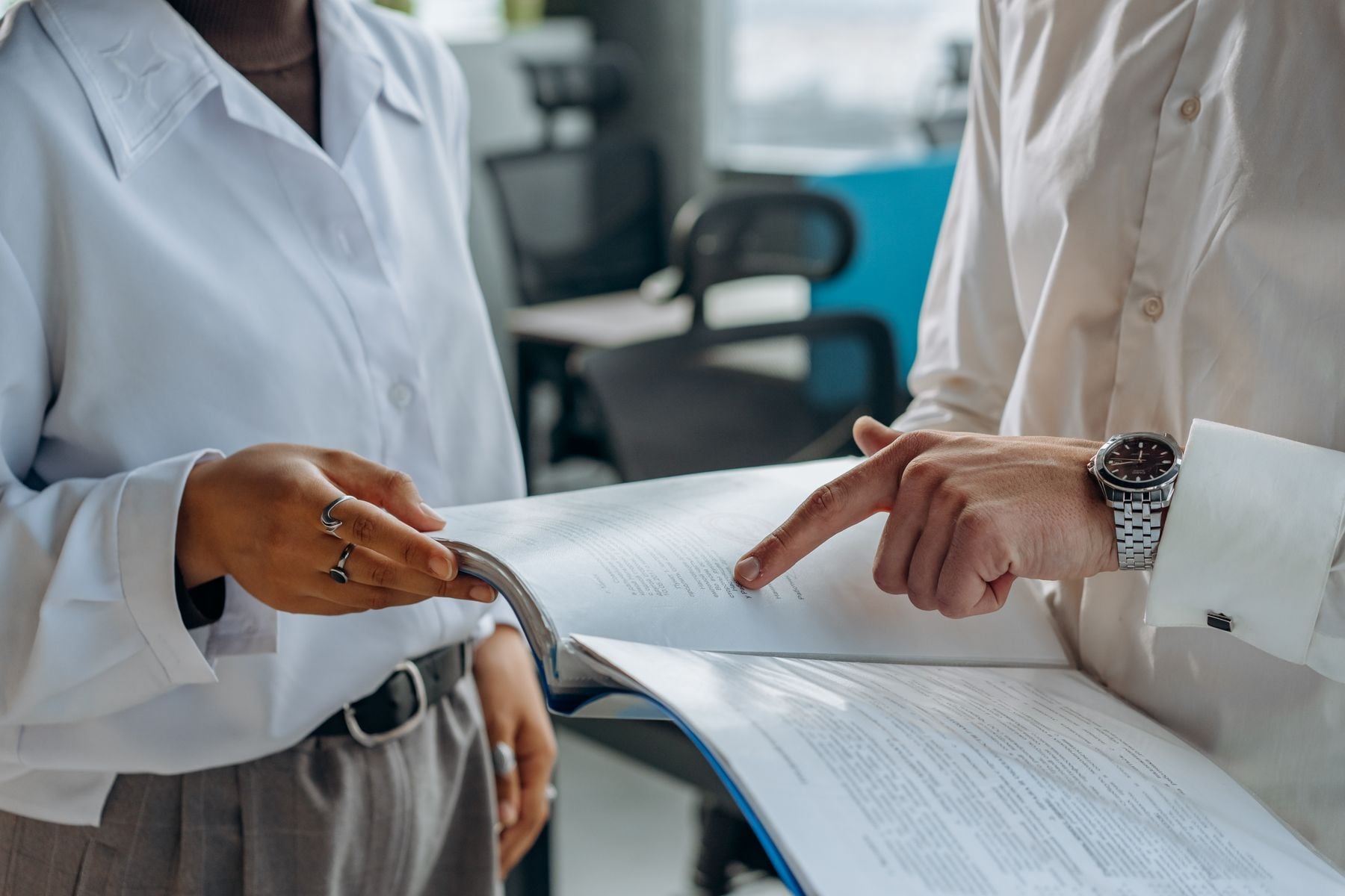No Credit Check Business Loans: What Exists, What Is a Scam and What Soft-Pull Funding Looks Like (2026) 2 Business owner reviewing financing paperwork at a desk