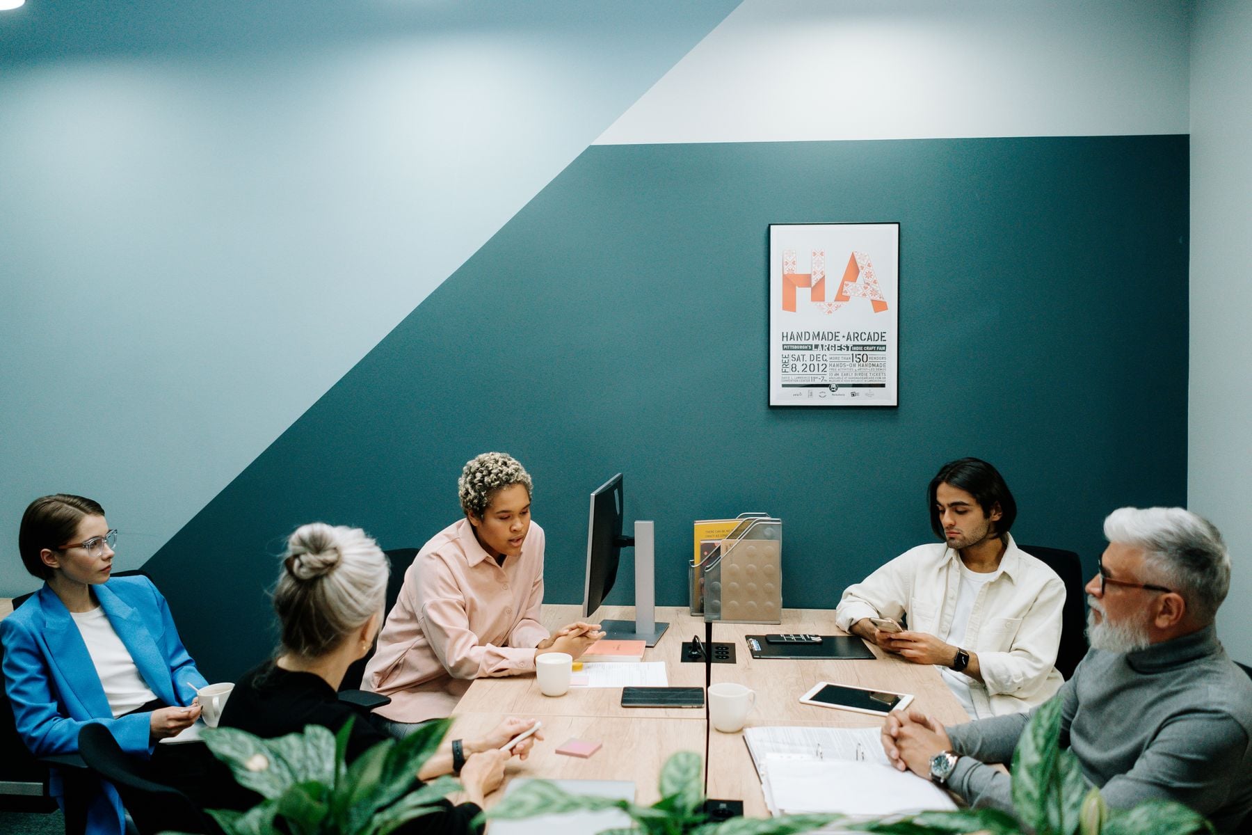 RAN Funding vs. Lendio, Fundera and LendingTree: What Happens to Your Application at a Broker vs. a Lead Marketplace 2 A business owner talking with one financing specialist across a table
