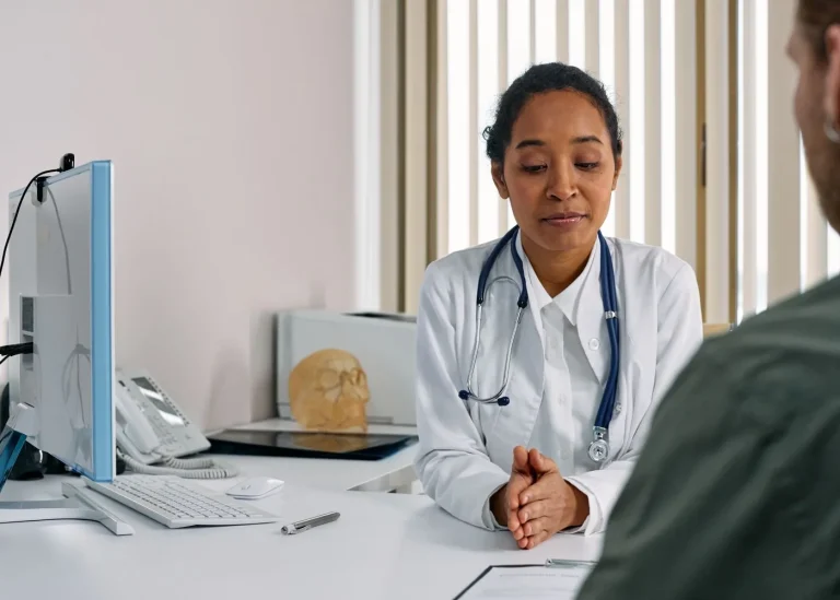 Doctor talking with a patient in a medical office
