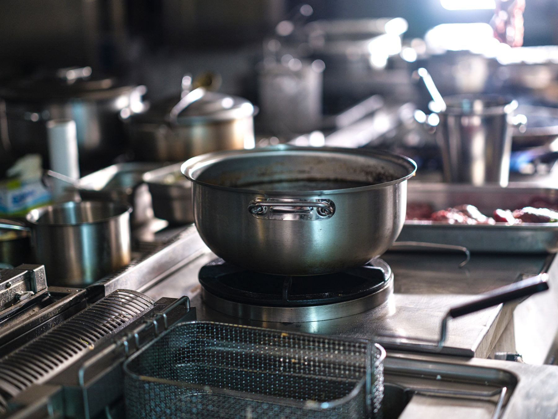 Restaurant Equipment Financing: Kitchens, Refrigeration, Hoods and POS (2026) 2 Commercial kitchen with stainless steel cookware and equipment