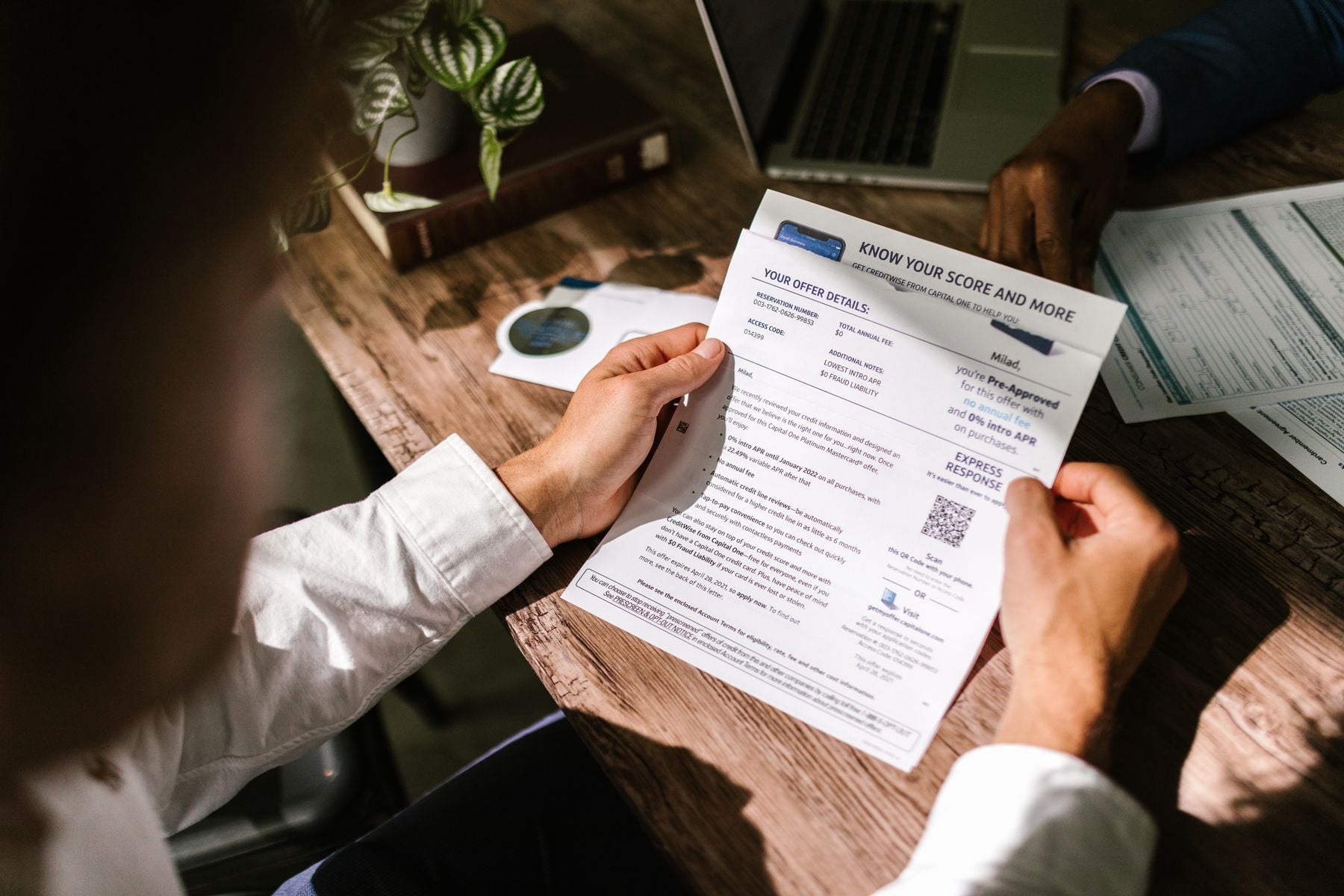 What Credit Score Do You Need for an SBA Loan? 2 Business owner examining a credit report before applying for an SBA loan