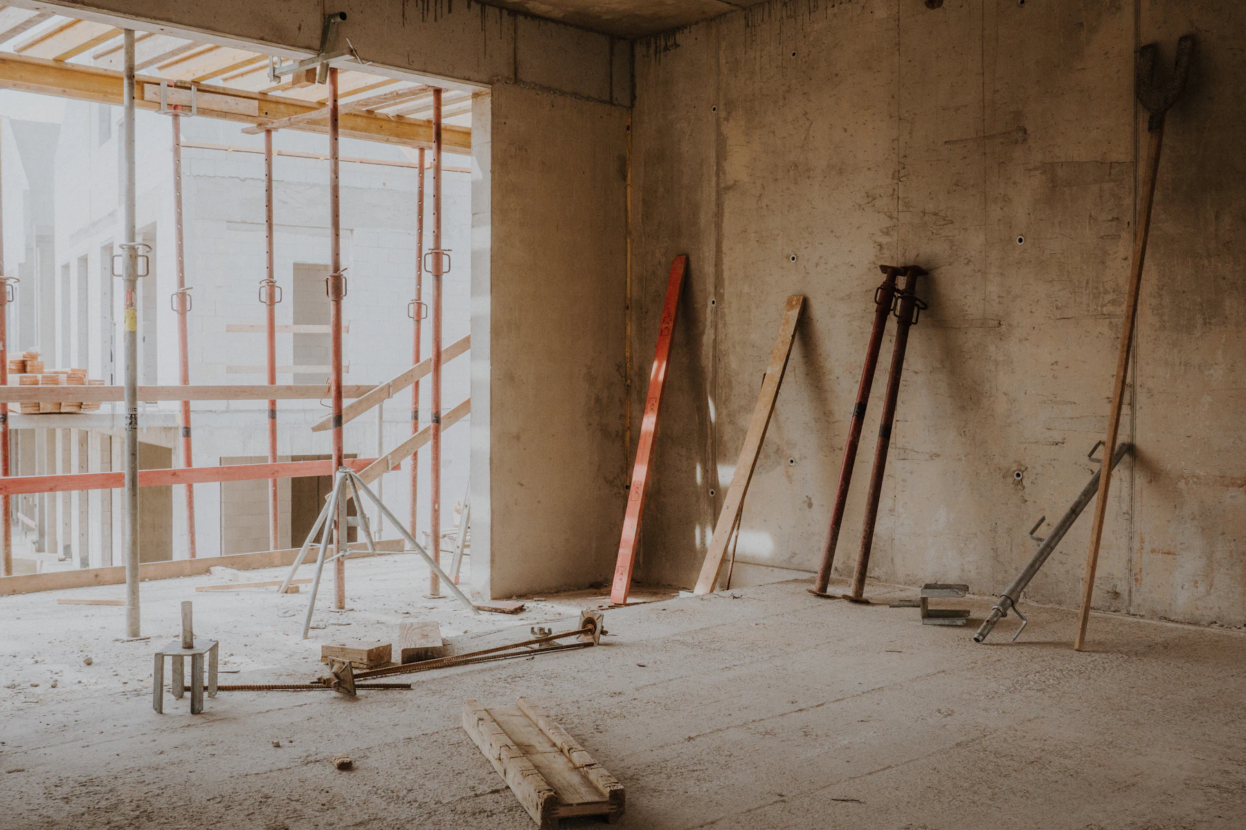 Commercial space under construction with scaffolding during a build-out