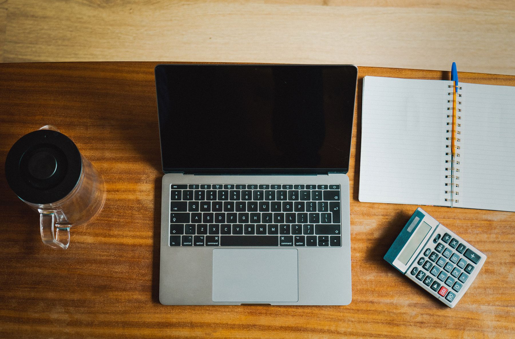 Secured vs. Unsecured Business Line of Credit: Which Should You Choose? 2 Two business owners comparing financing paperwork across a desk