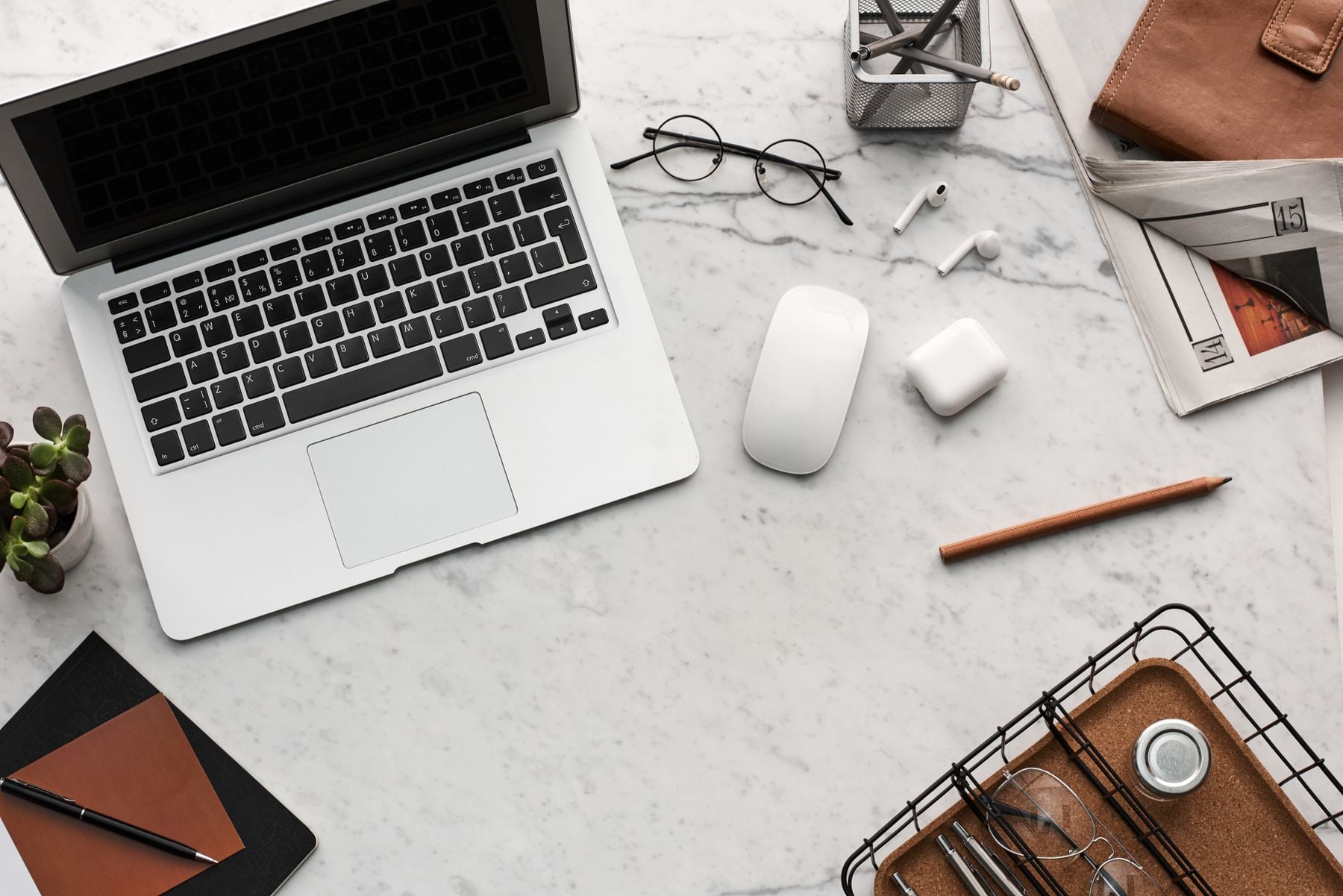 Unsecured Business Line of Credit: Limits, Rates, Requirements and How to Get One (2026) 2 Laptop, notebook and coffee on a desk ready for a credit application