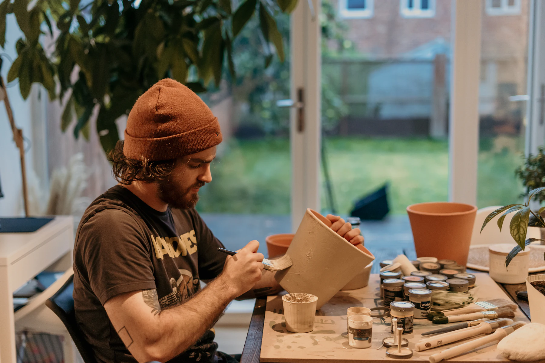 Working Capital Loan Requirements 2 Craftsman working with wood at a workbench